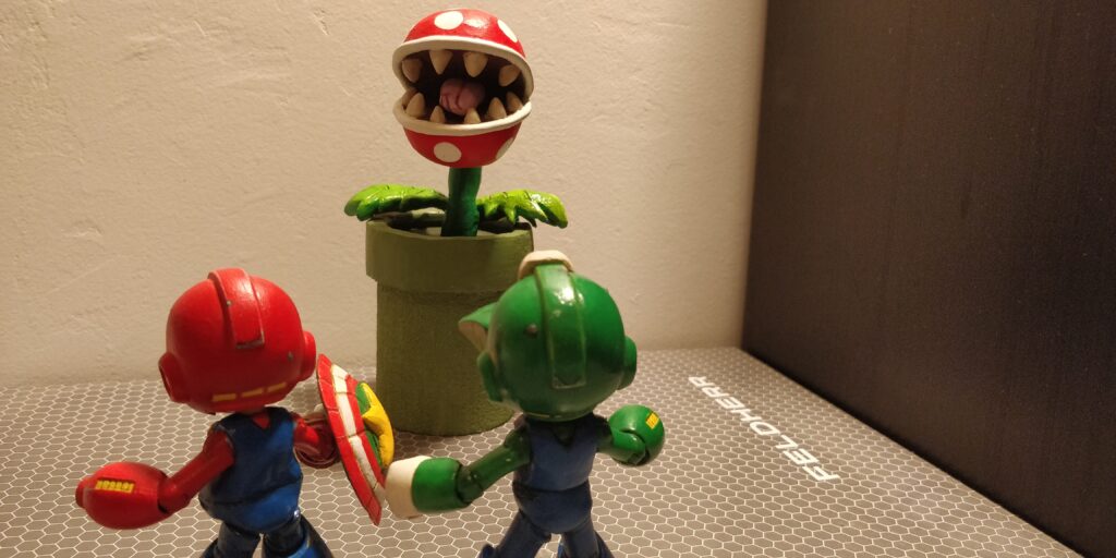 Plante face à Mario et Luigi Mega Man