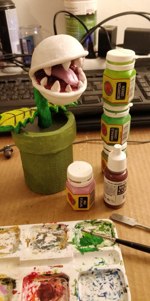 la bouche et le haut des feuilles peint avec des vieux pots games workshop et un peu de valejo